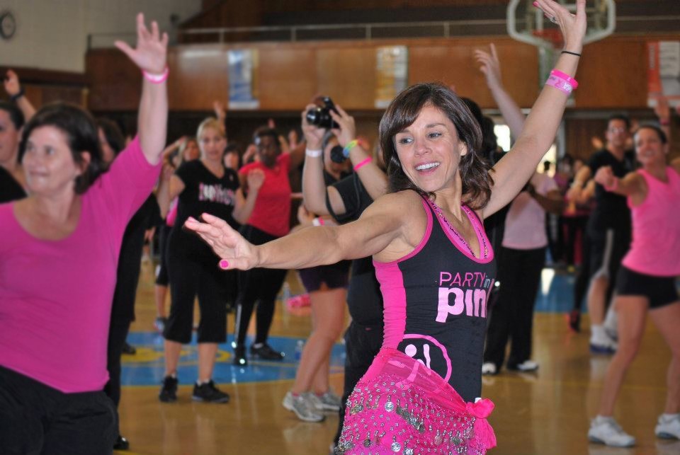 Michele McCallion Ayoub dancing at a fundraiser