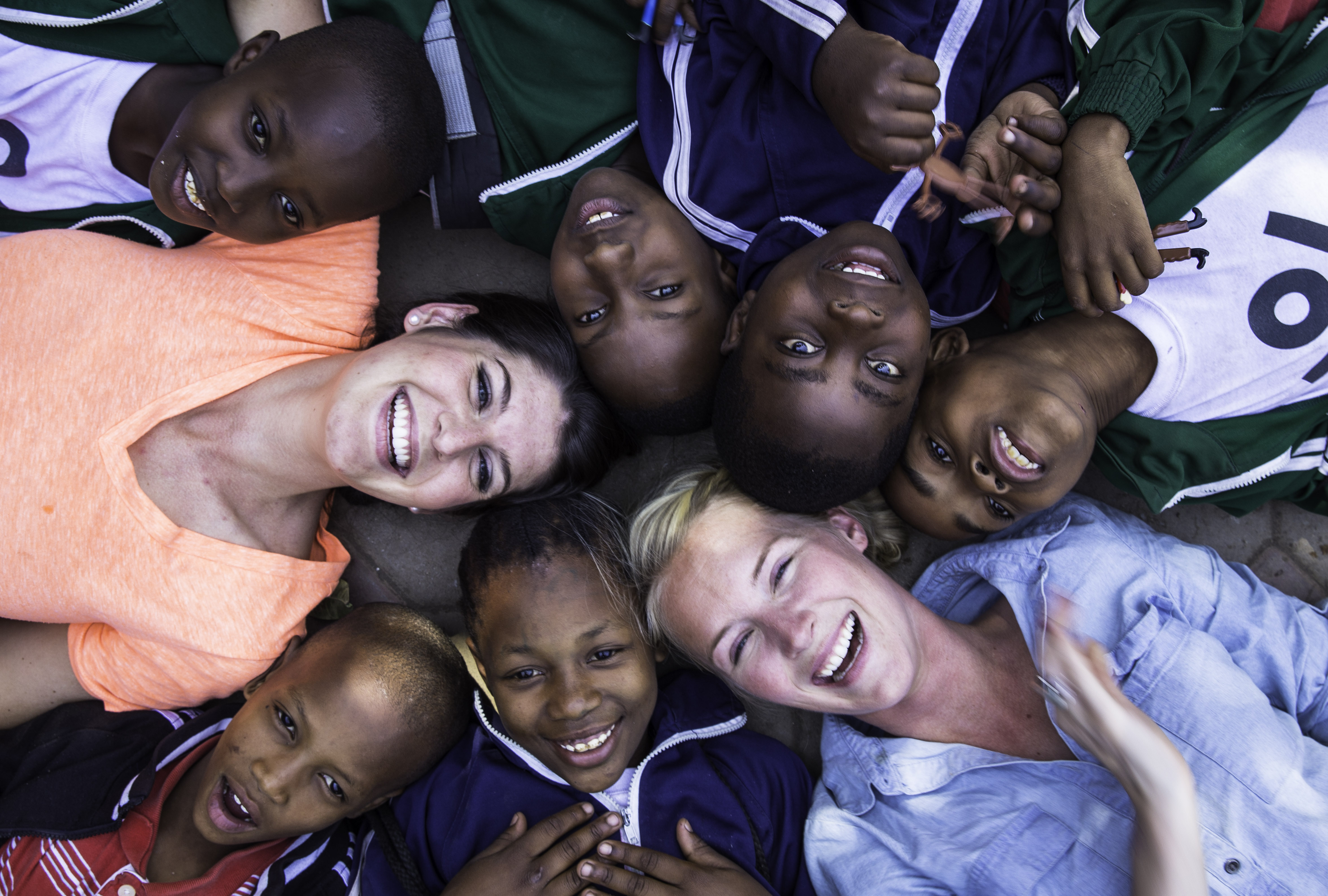 Hannah (left) and Katie (right) with students from the Glorious campus in Tanzania.