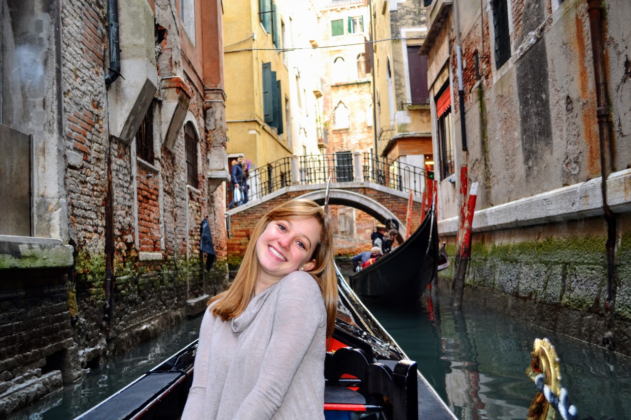 Kaitlyn posing in a gondola