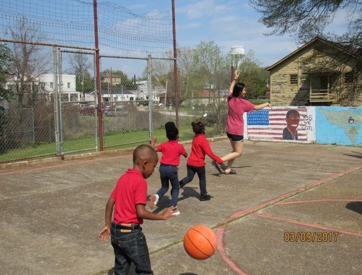 Students playing basketball