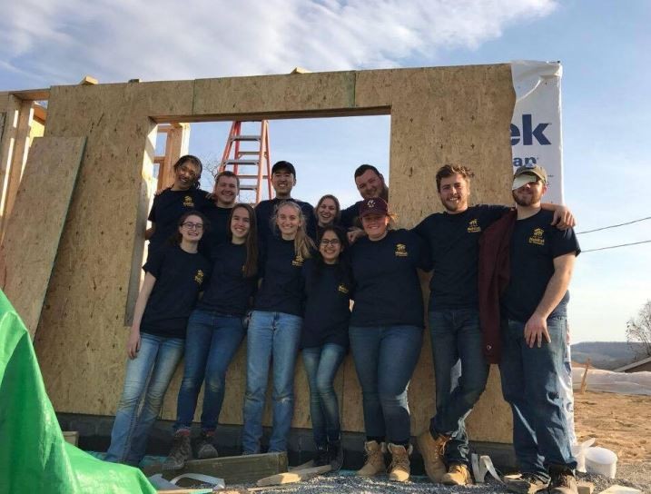 Carroll School students: Dylan Taylor ’18 (second from right, first row); John King ’18 (second from left, top row); and Amy Flahive ’19 (third from right, first row).