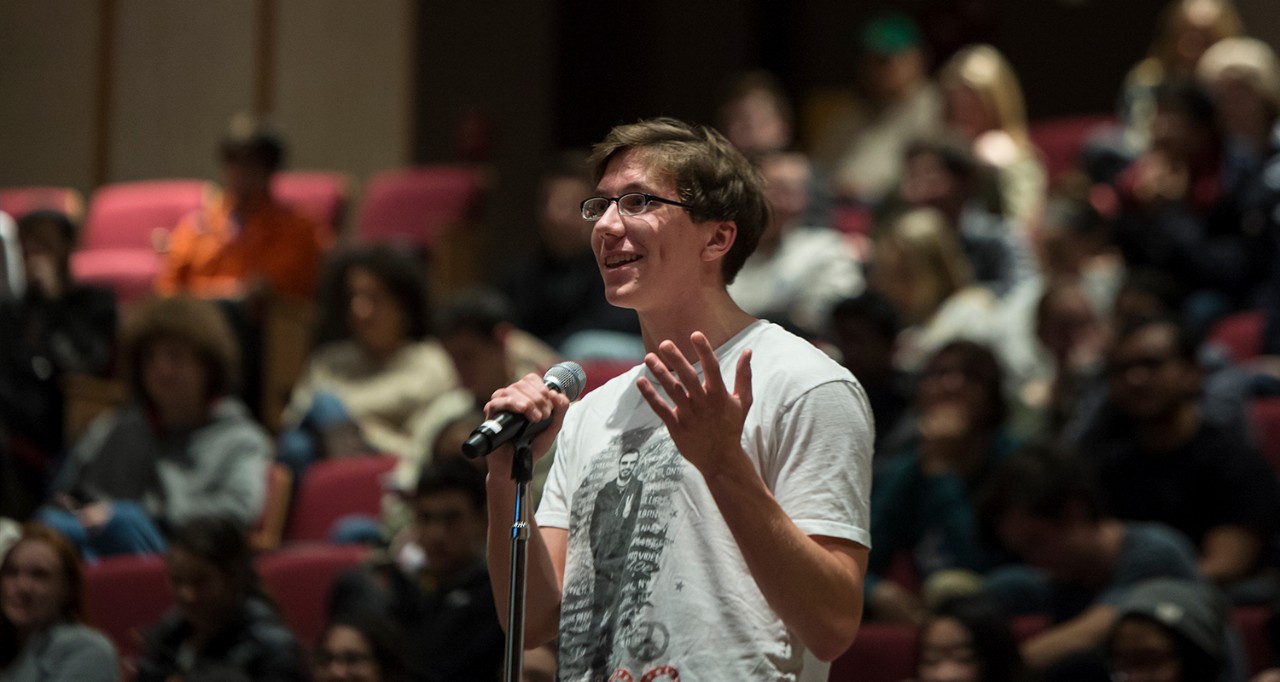 A student asks a question at a Winston Center event