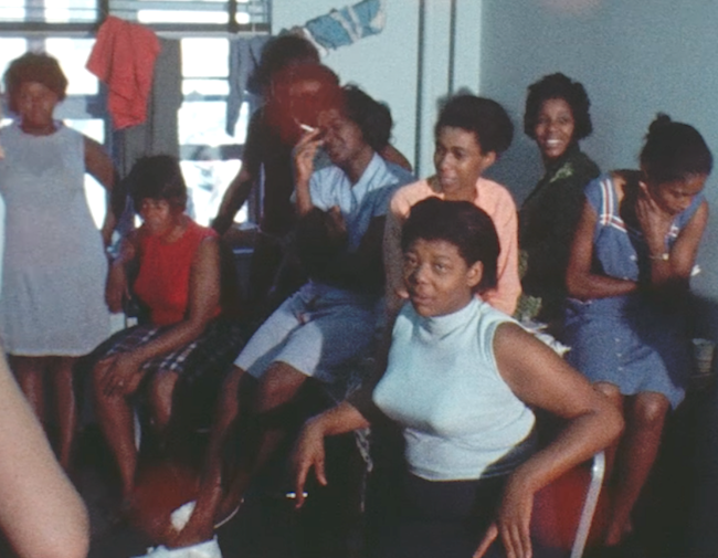 A group of black women in a old color film photo