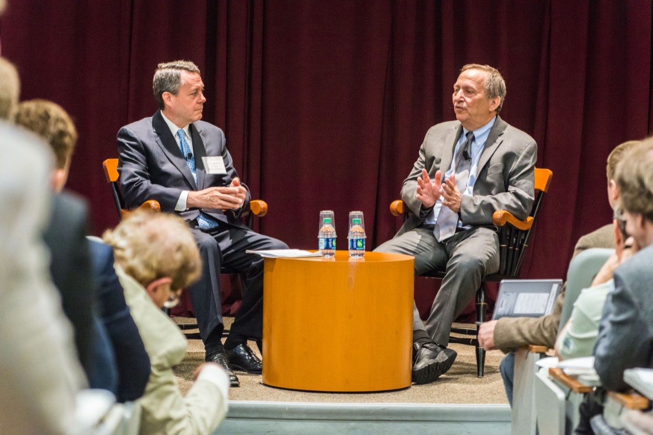 Dan Holland and Lawrence H. Summers sit on a panel at the Boston College Finance Conference