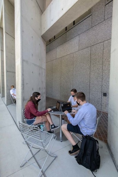 masked students collaborating outside of O'Neill Library