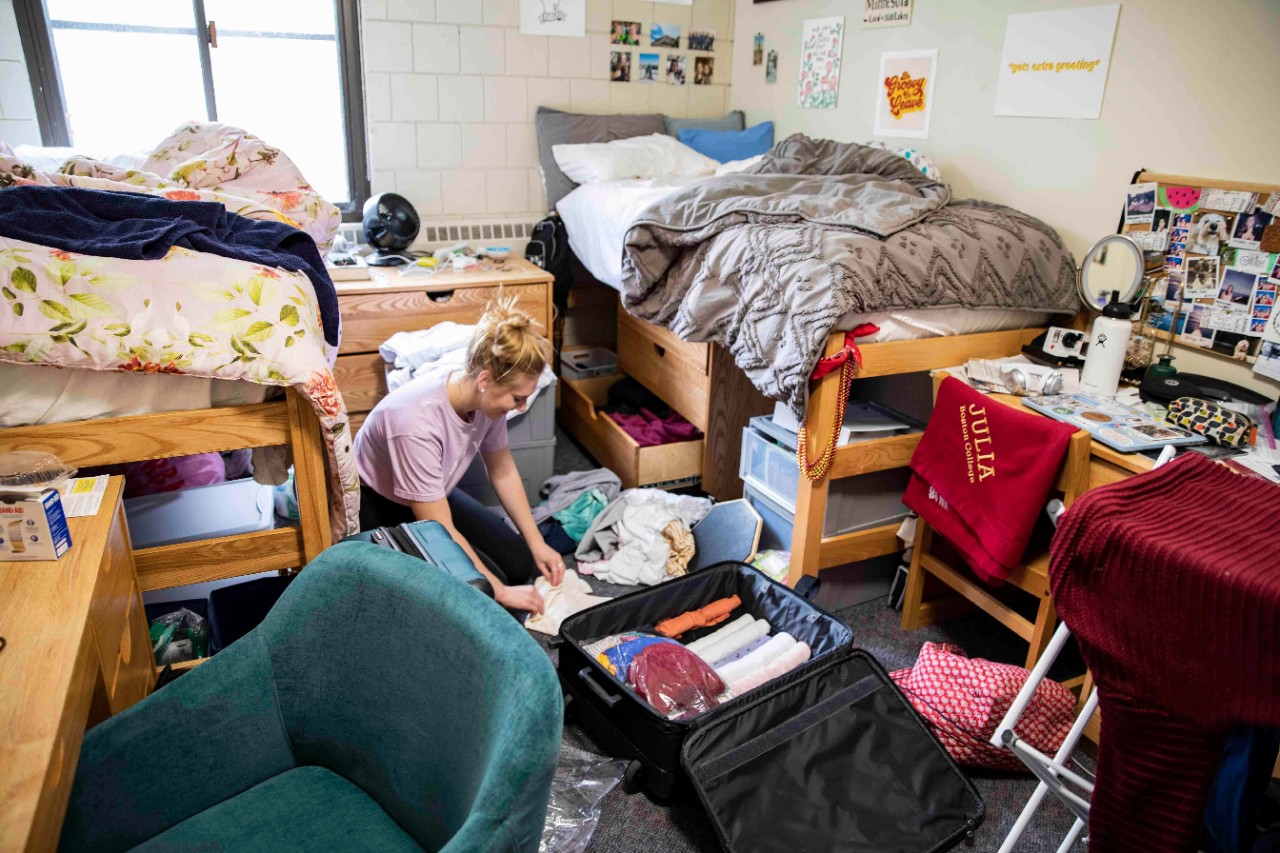 a student packing up a dorm room