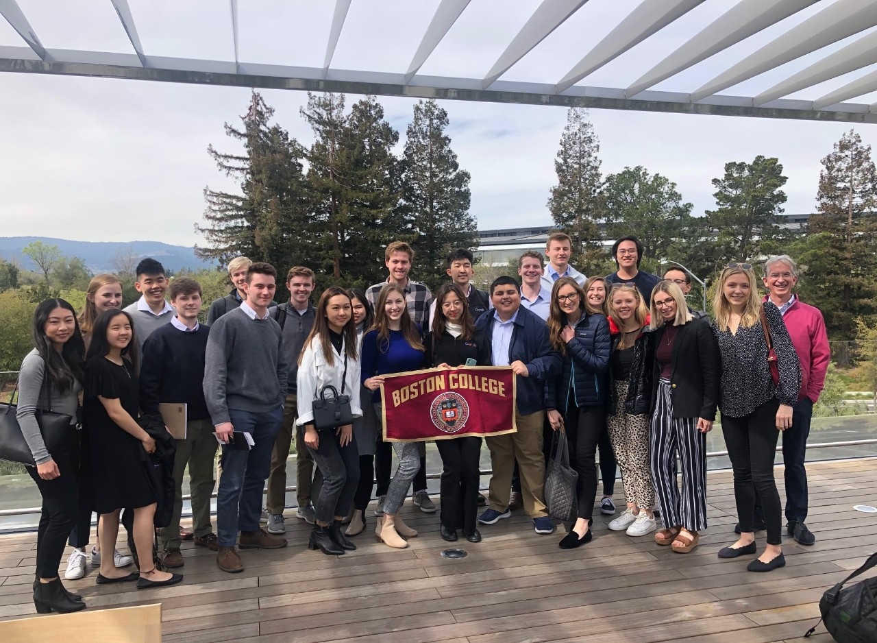 Students on TechTrek with a BC flag