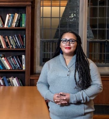 Julia Parker, M.B.A. '21, a black woman, in the Fulton Honors Library