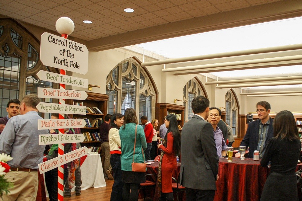 Faculty and staff gather in Fulton Honors Library