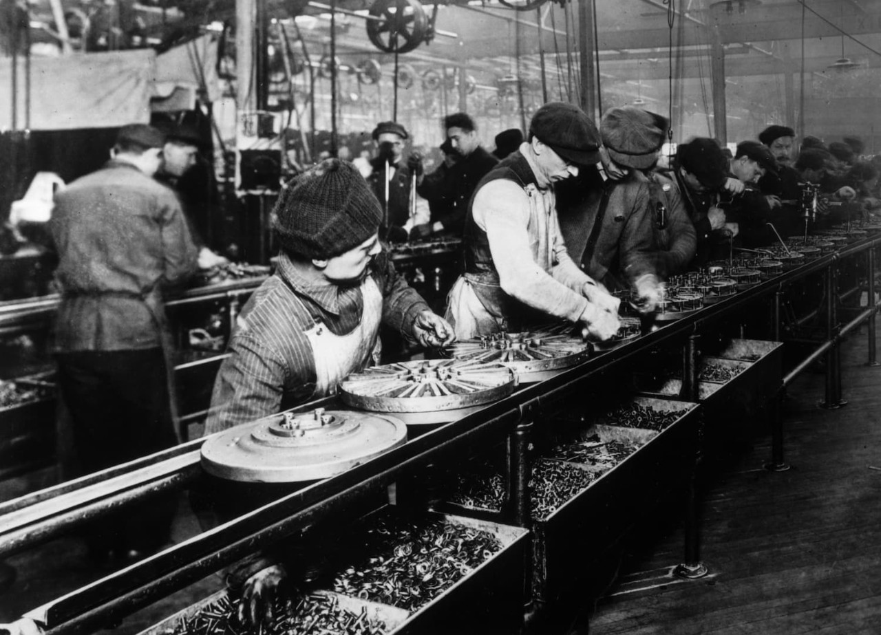 Higher wages allowed Henry Ford to "implement standardization on the assembly line and in the broader workforce," say the authors.