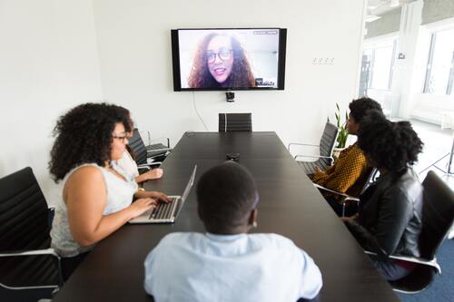 people sitting around a Zoom call