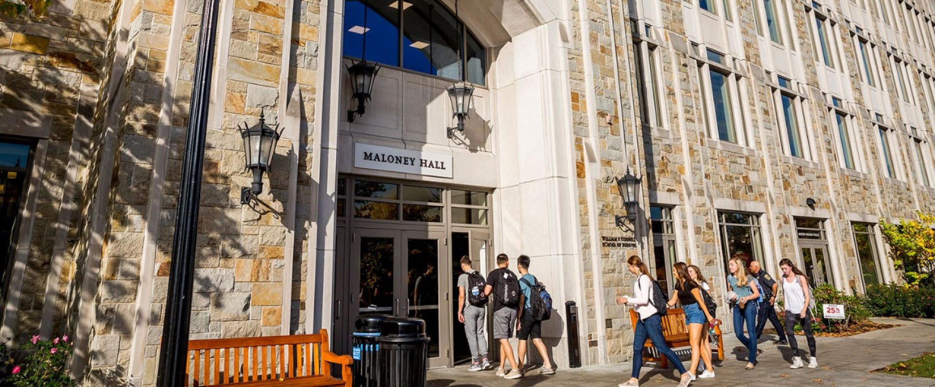 students outside of Maloney Hall