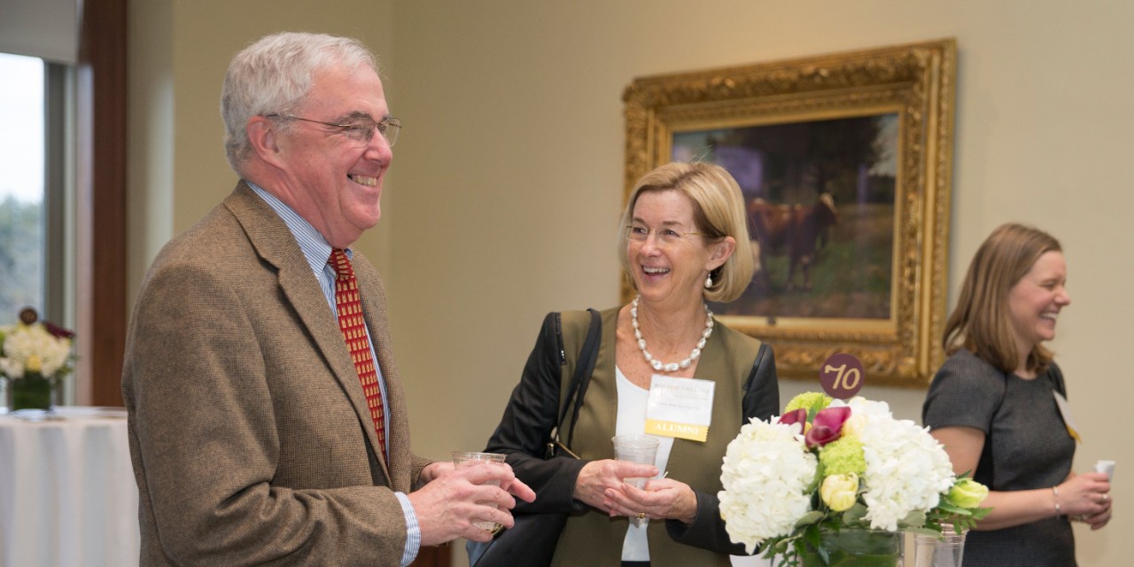 James O'Toole, Clough Professor of History, speaks to Mary Beth Sandman '69