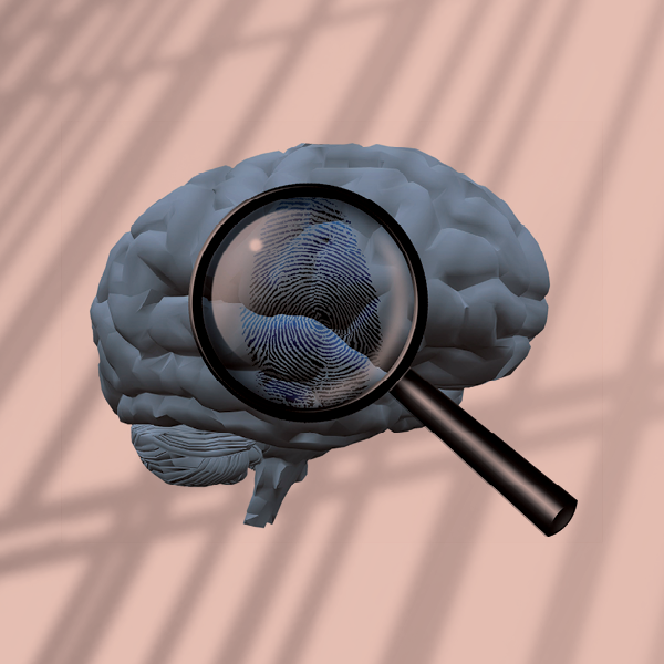 Brain being examined by magnifying glass