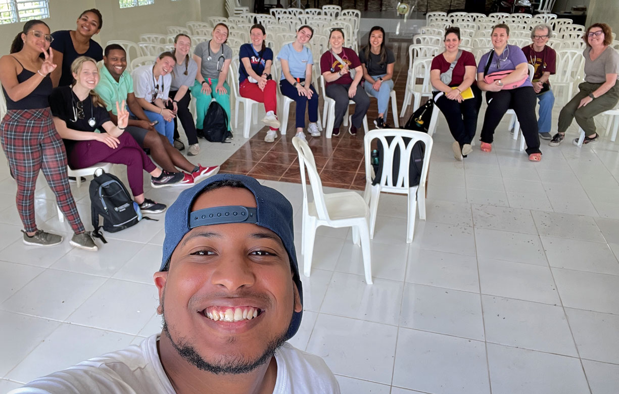 Students and faculty with their translator