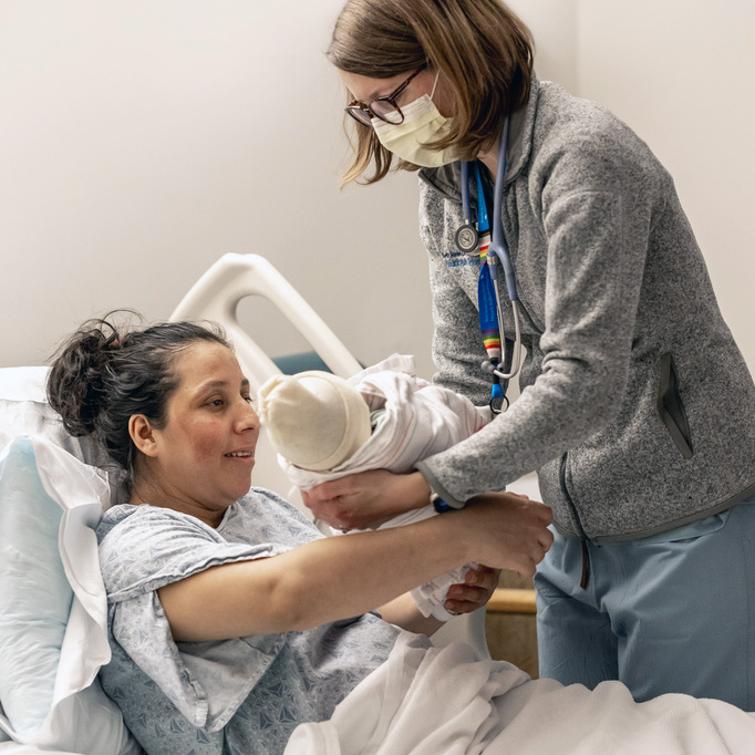 January 27, 2025 -- Boston College Connell School of Nursing​ participati​ng in the midwifery program at Mount Auburn Hospital in Cambridge, Massachusetts, with Katie (Katharine) Hutchinson, Associate Professor of the Practice, Connell School of Nursing​ (black blazer)​, and Julia Dickinson, Director of Midwifery Services, Midwives at Mount Auburn Hospital (scrubs).