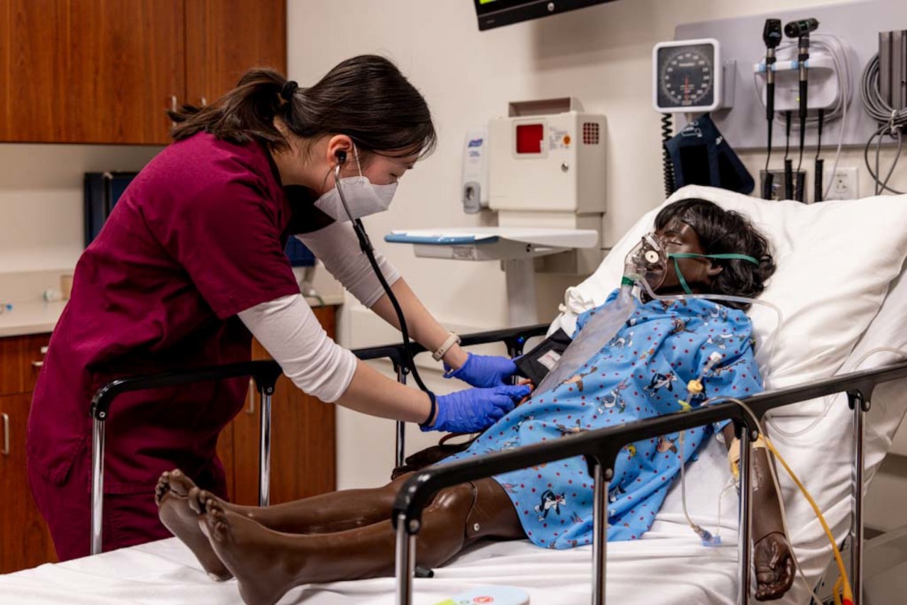 Students treat a patient in 