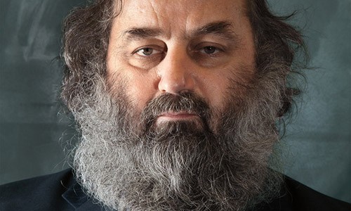 Dennis Maher looing into camera