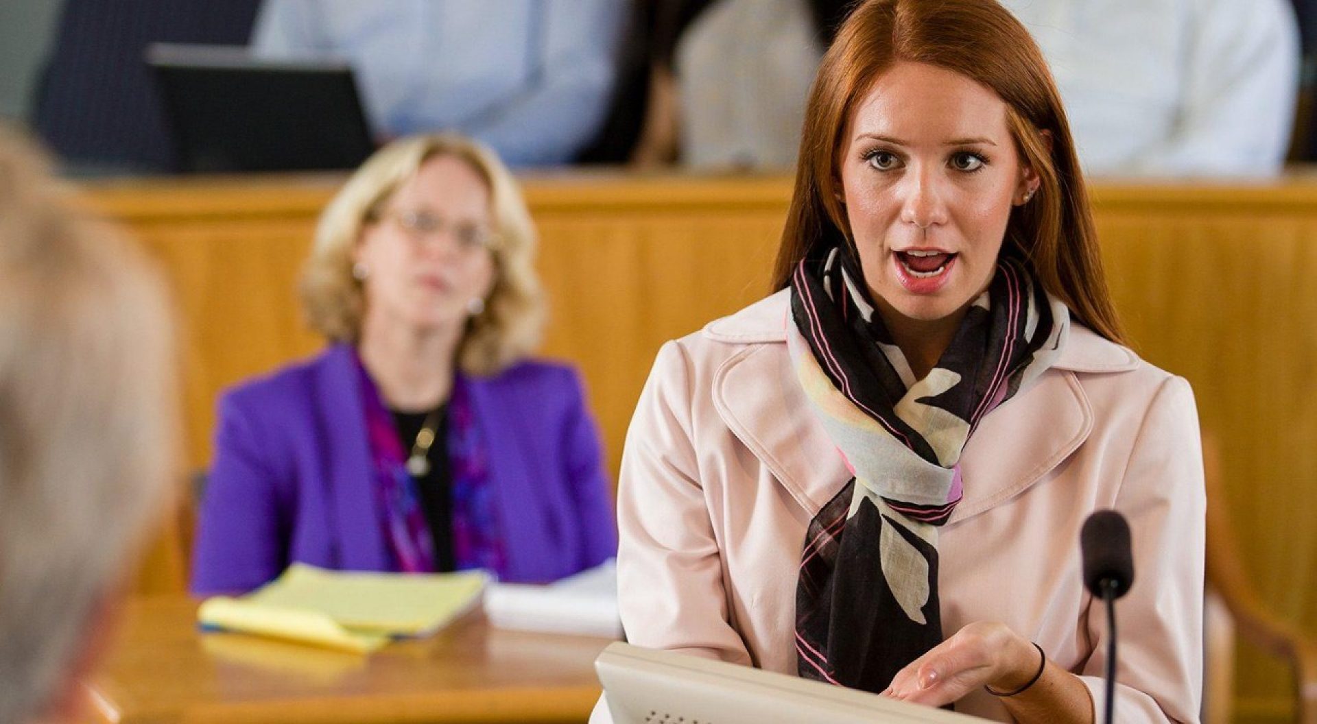 a person standing in a courtroom