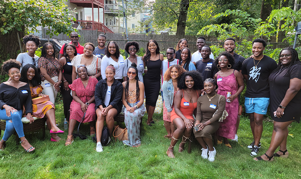 Incoming Black BC Law students pose in a backyard