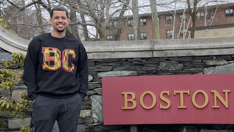 Travis Salters ’23 wears his custom BC Law sweatshirt with Afrocentric stitching, a gift from BAN to all 1Ls in BLSA.