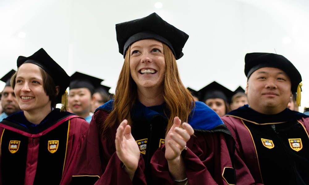 Graduates listening to address