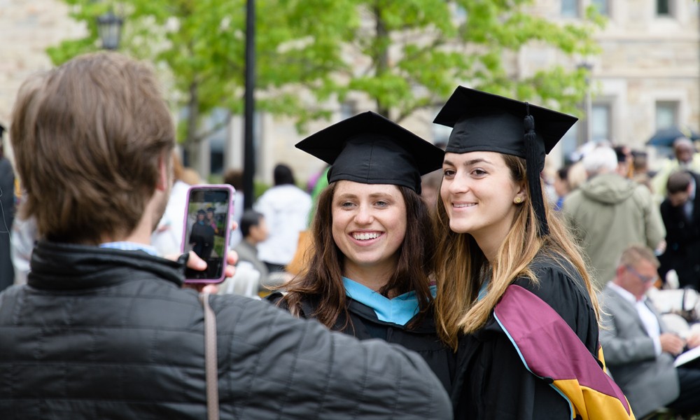 Graduates pose for photos