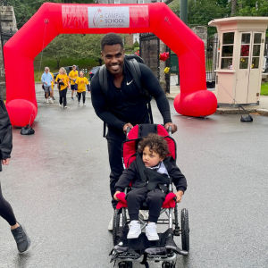 A Campus School parent and his son at the Run n' Roll