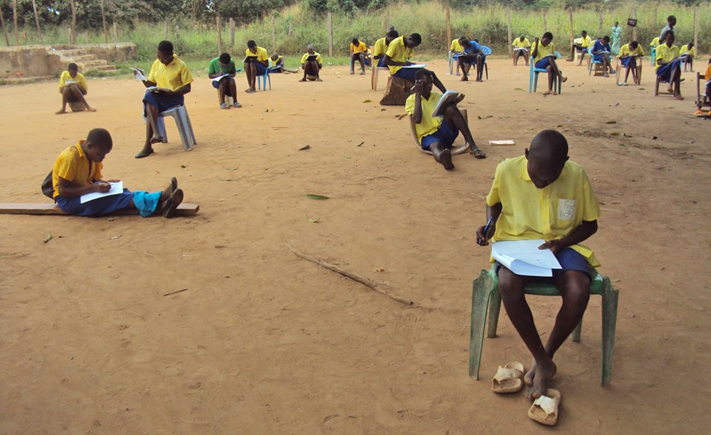 Photo of  Students study after class in Yambio, South Sudan, where outbreaks of violence have deterred many from enrolling in school.  (Aidan Azairwe/Jesuit Refugee Service)