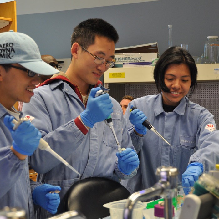students in lab gear