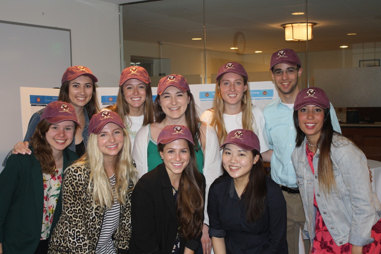 Photo of 2017 Honors students wearing Communication Department baseball hats