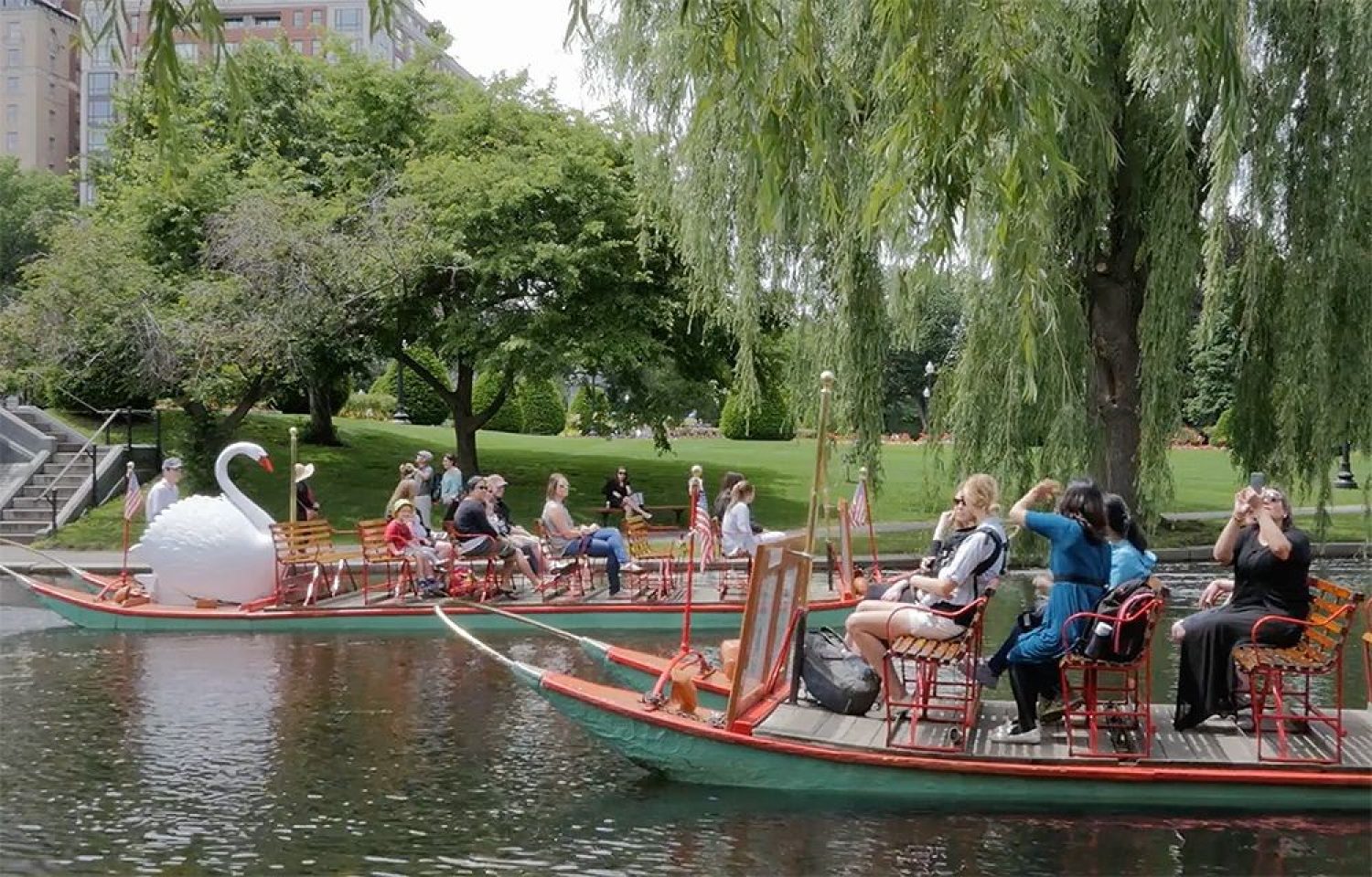 People riding the Swan Boats at Boston Public Garden
