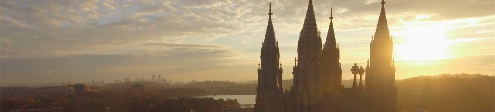 The city of Boston at sunset, as viewed from the top of Gasson Hall on BC's campus.