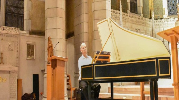 Photo of Peter Watchorn on the harpsichord at St. Mary's Chapel in Newton