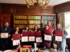 Photo of Graduate students receive certificates