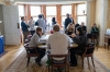 Photo of Faculty and PhD Students gathering 