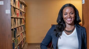 Photo of Image of Professor Lacee Satcher posing for a photo