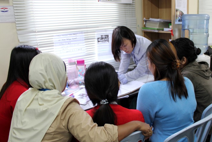Volunteers joining the Refugee Women’s Protection Corps are trained and coached by Jackie Loo