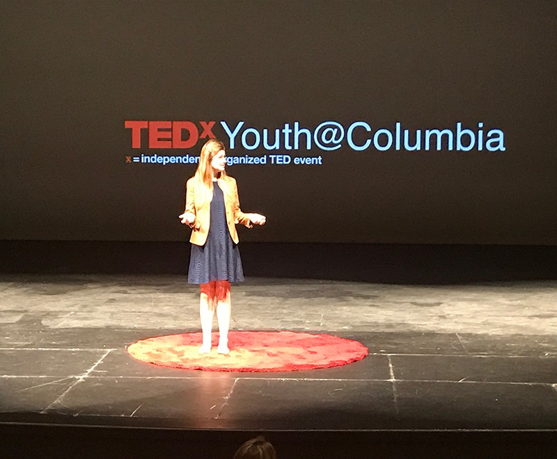 Victoria Hamilton presenting at a TEDx Youth Event.