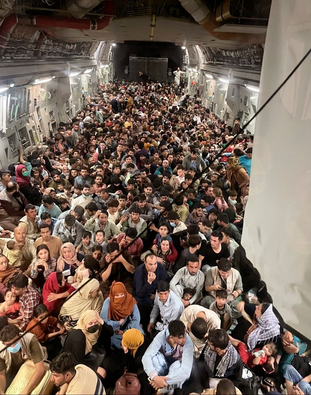 Afghan citizens pack inside a U.S. Air Force C-17 Globemaster III