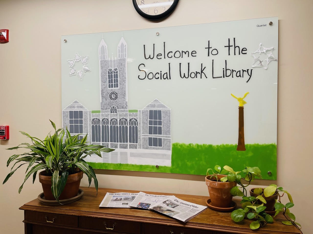 A painting of Gasson Hall that says "Welcome to the Social Work Library"
