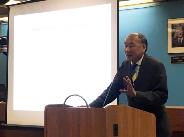 Associate Dean of Research David Takeuchi presents on the Integration of Immigrants into American Society report at Boston City Hall.