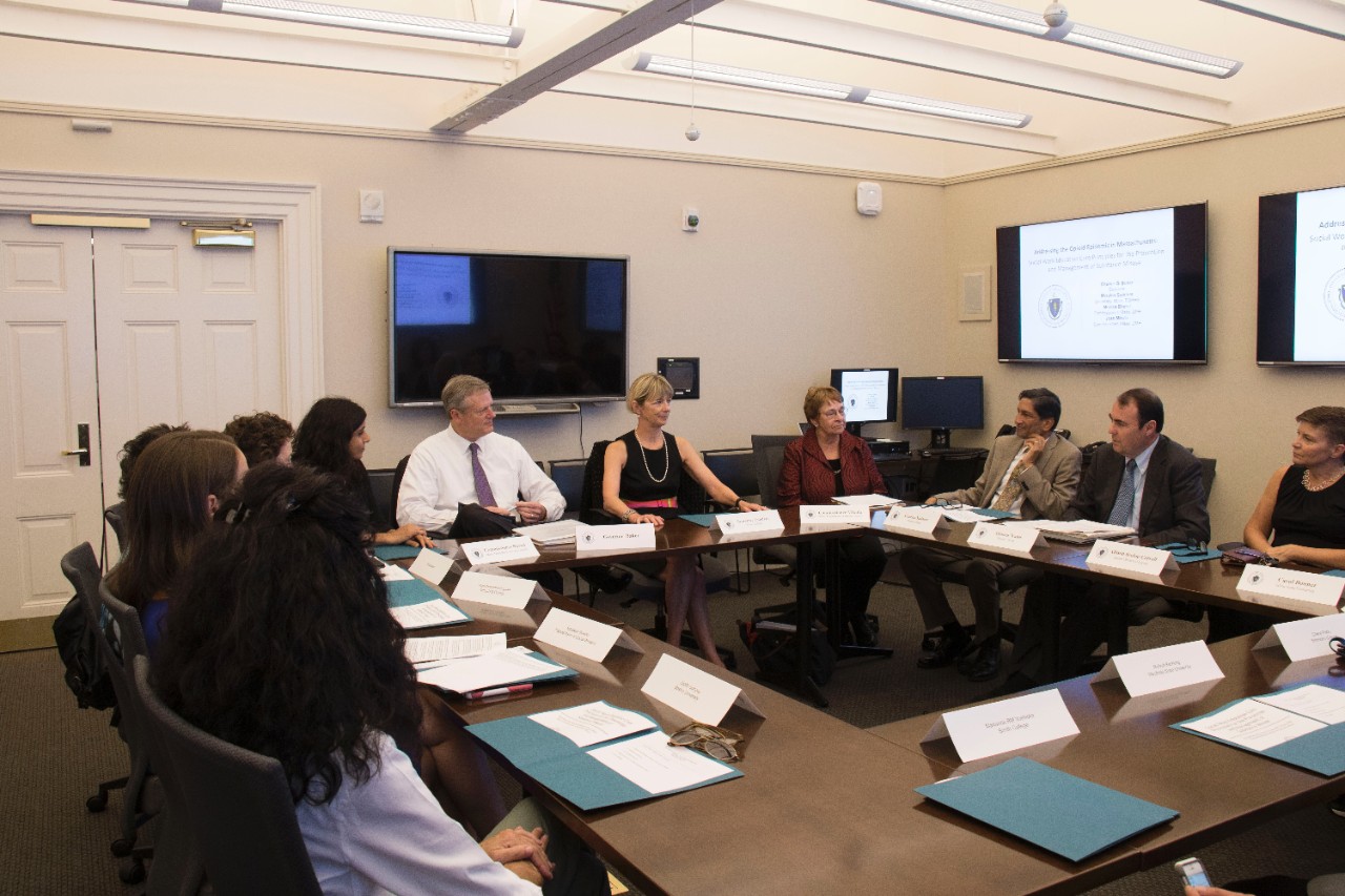 Walsh_Yadama_Baker_Sudders_Opioids Walsh and Yadama (second & third from right) visit with Governor Charlie Baker, Secretary Marylou Sudders, and representatives from the nine schools of social work in Massachusetts.