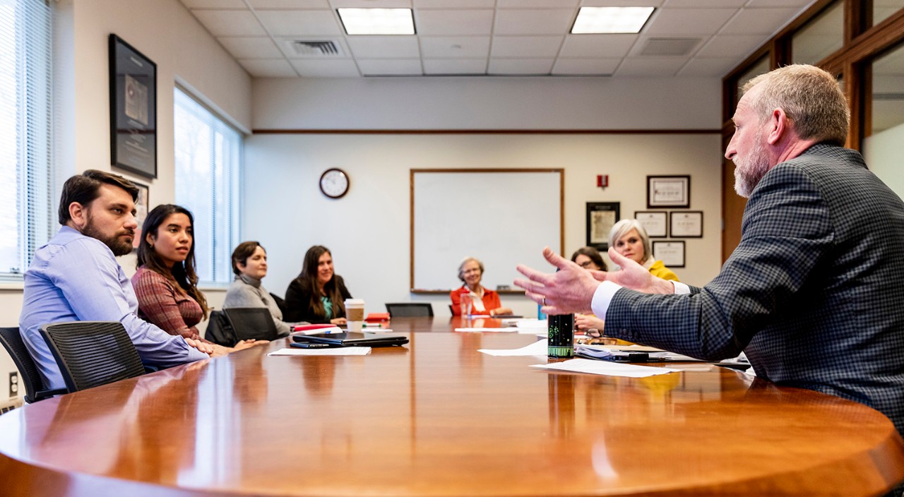 PUC-comm-mtg-1500x825 The PUC team meet with staff working in area interdisciplinary law clinics.