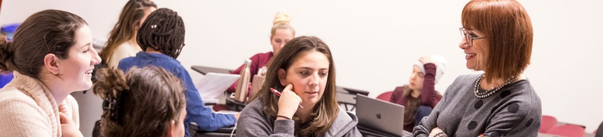 Faculty in classroom with students