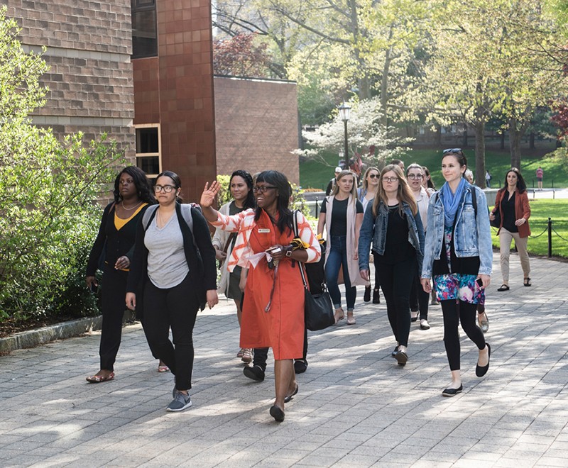 Patty Birch leads a campus tour