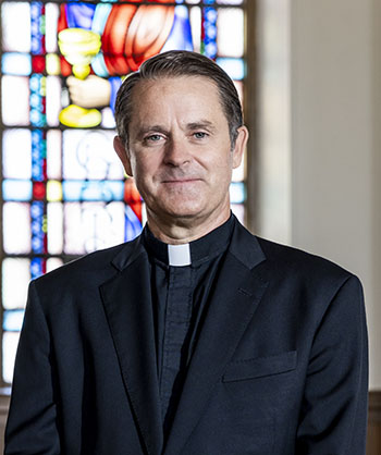 July 20, 2022 -- Boston College's Dean of the School of Theology and Ministry, Fr. Michael "Mick" McCarthy, SJ. Photographed in Simboli Hall.