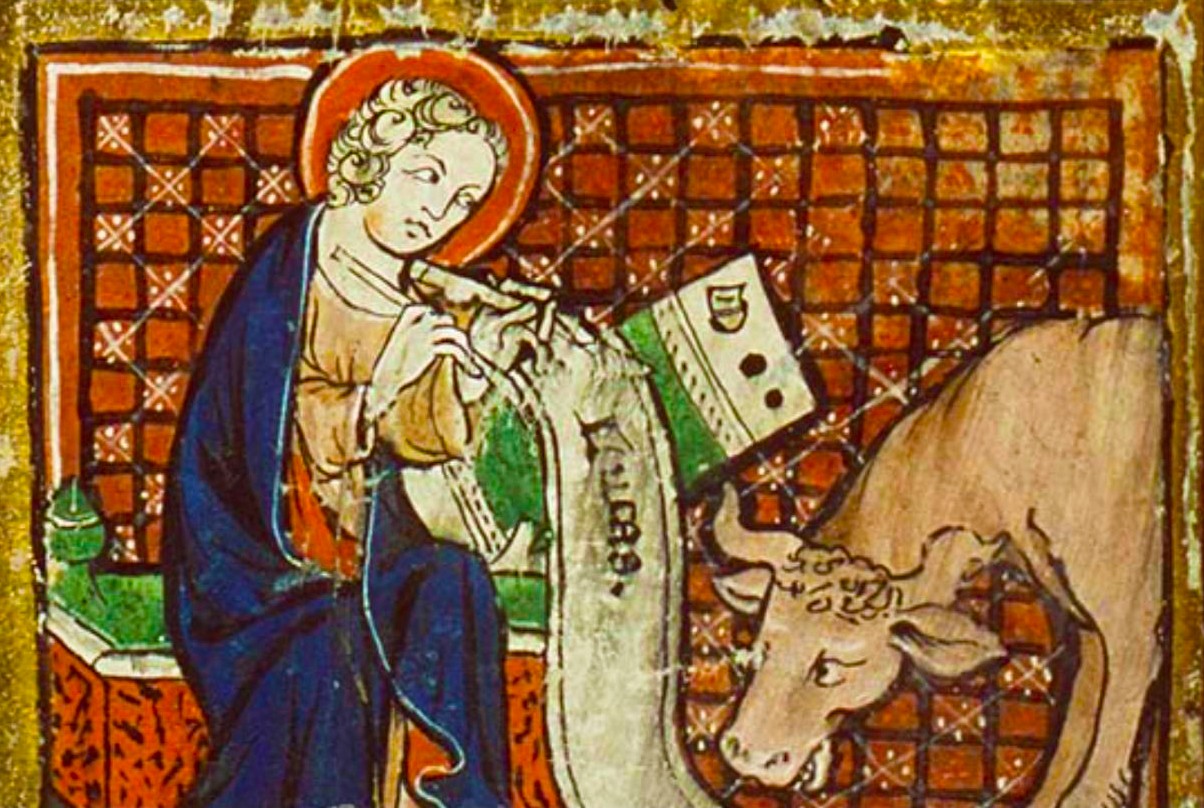 St. Luke writing with his bull from an illuminated manuscript