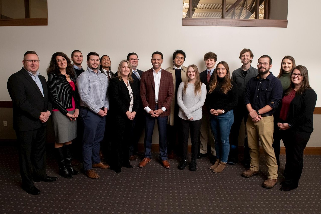 Photo of Woods College Manresa Scholars and faculty mentors with Steve Pemberton