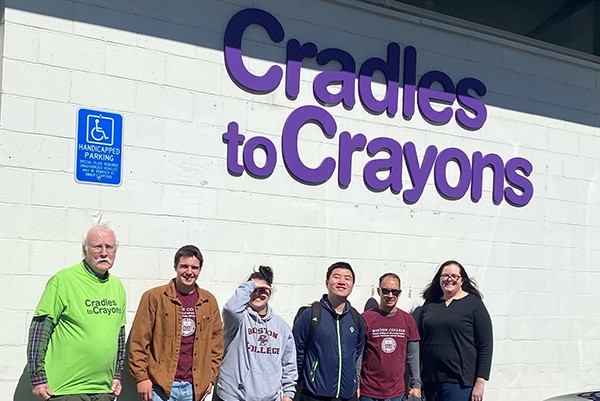 Woods Community members at Cradles to Crayons